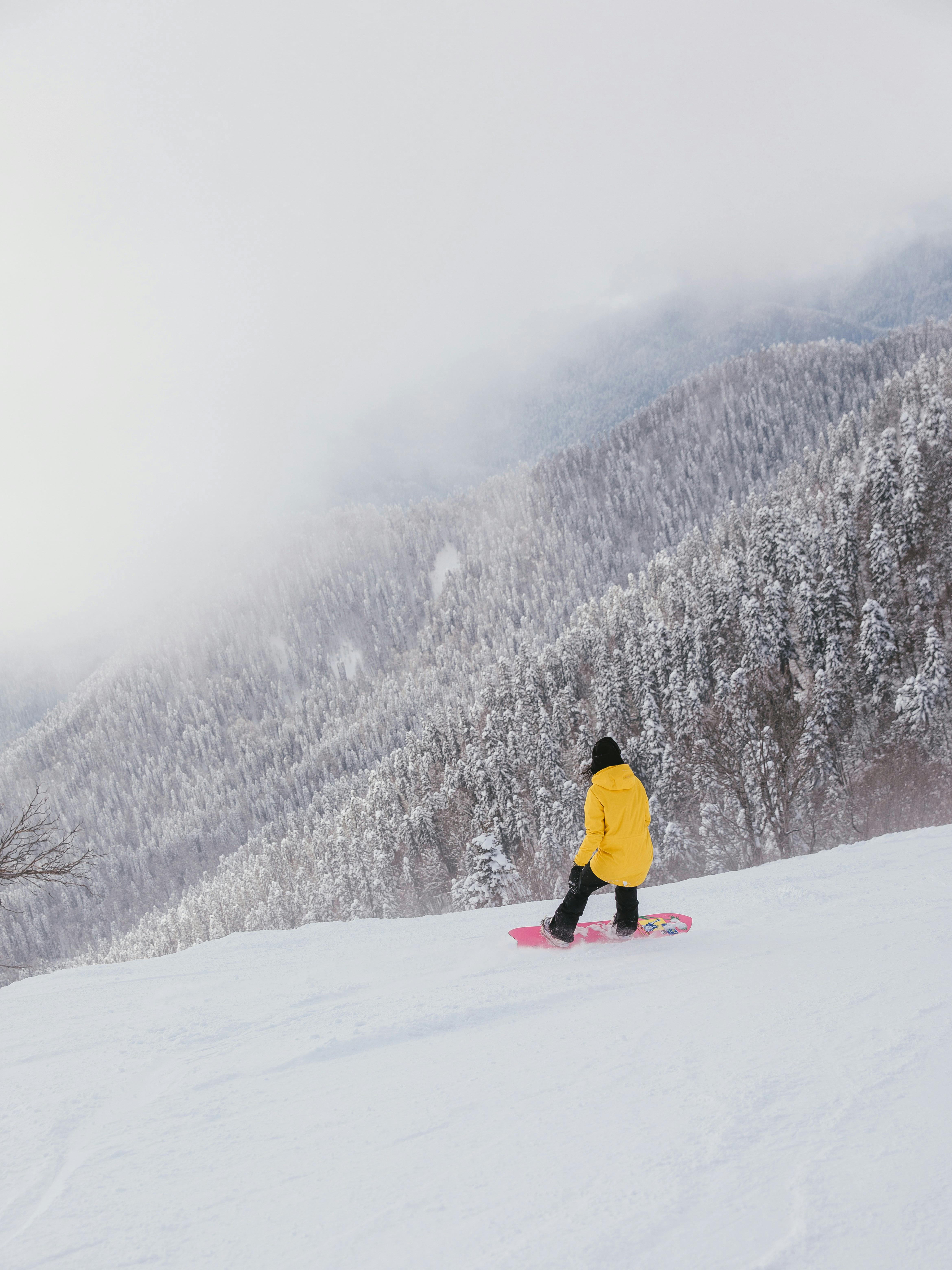 Rider, yellow jacket, pink board